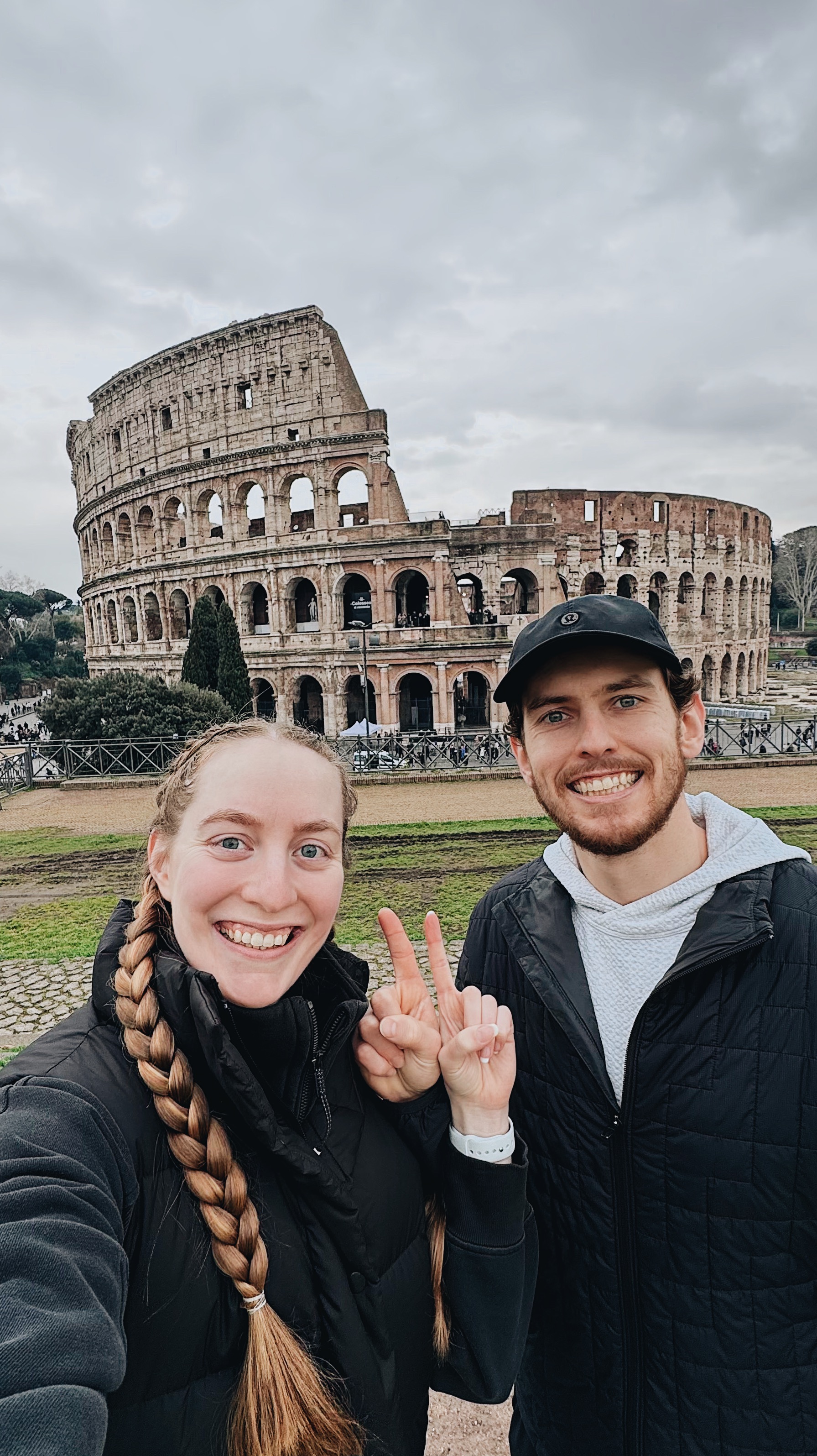 Nicholas and Mackenzie in front of the Colosseum in Rome