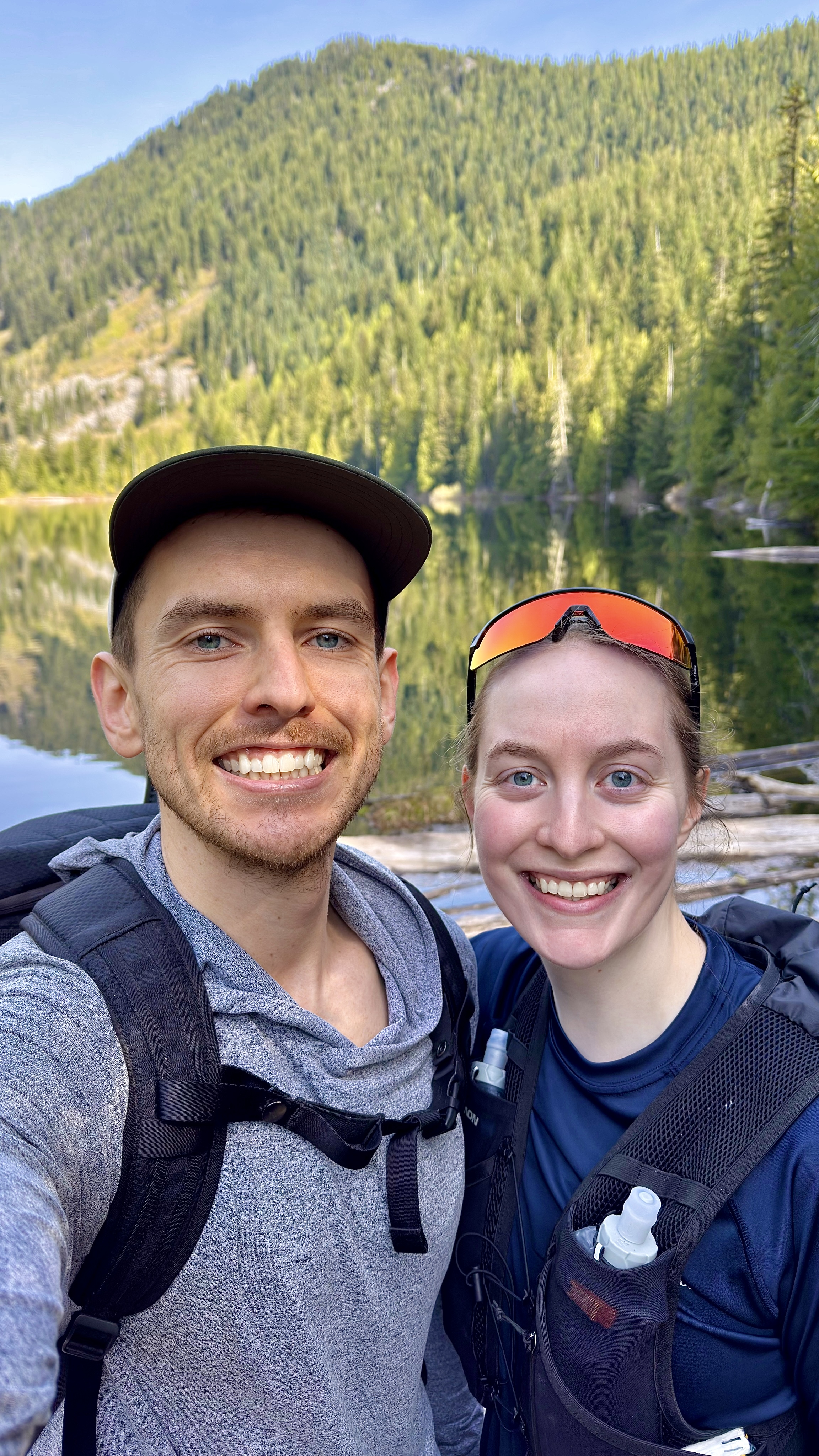 Hikers in front of a lake